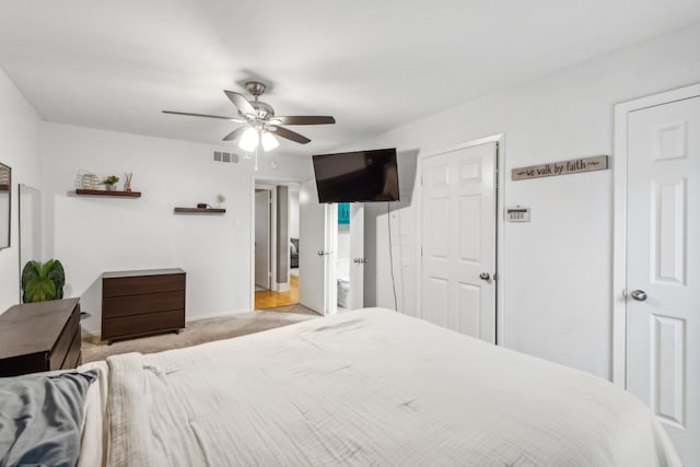 carpeted bedroom featuring ceiling fan