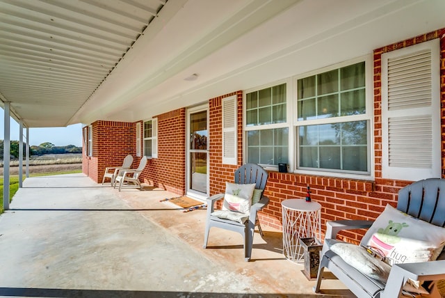 view of patio featuring a porch