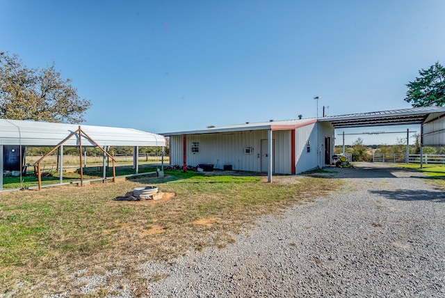 exterior space with a carport