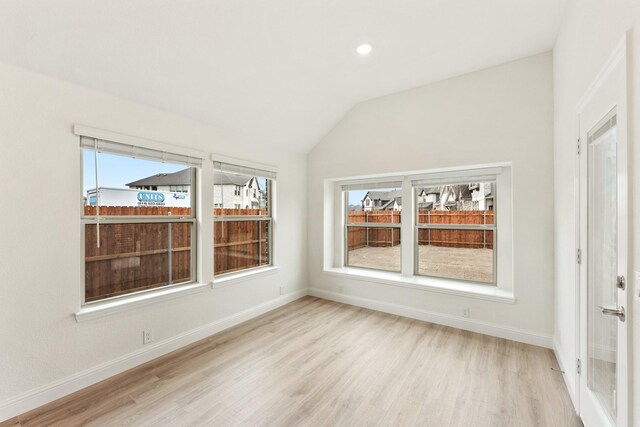 carpeted bedroom featuring vaulted ceiling and ceiling fan