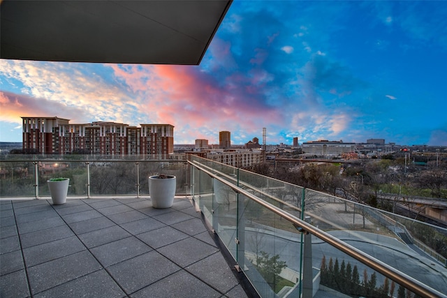 view of balcony at dusk