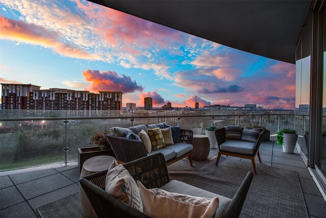 patio terrace at dusk with an outdoor living space