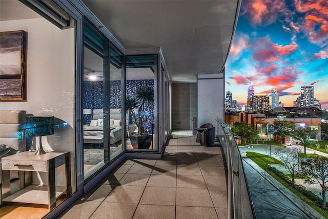 view of balcony at dusk