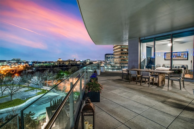 view of balcony at dusk