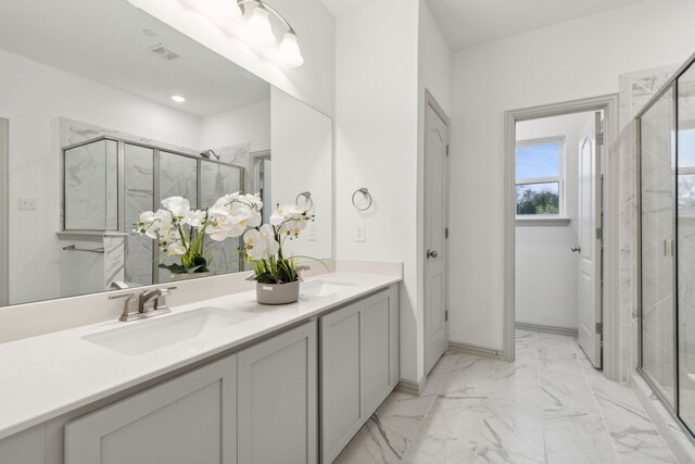 bathroom featuring vanity and walk in shower