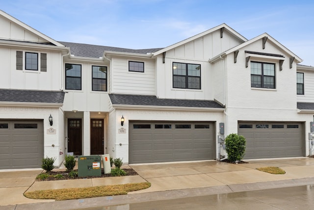 view of front of property with a garage