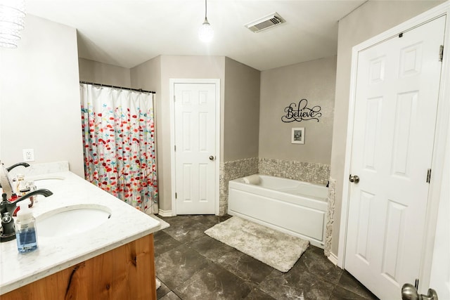 bathroom featuring a bathtub and vanity