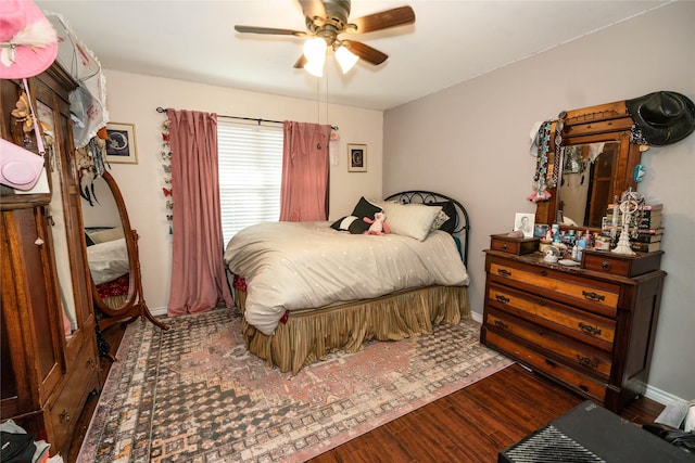 bedroom featuring ceiling fan and hardwood / wood-style floors