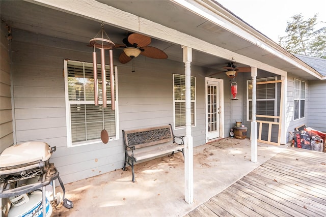 exterior space with ceiling fan