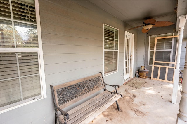 view of patio featuring ceiling fan