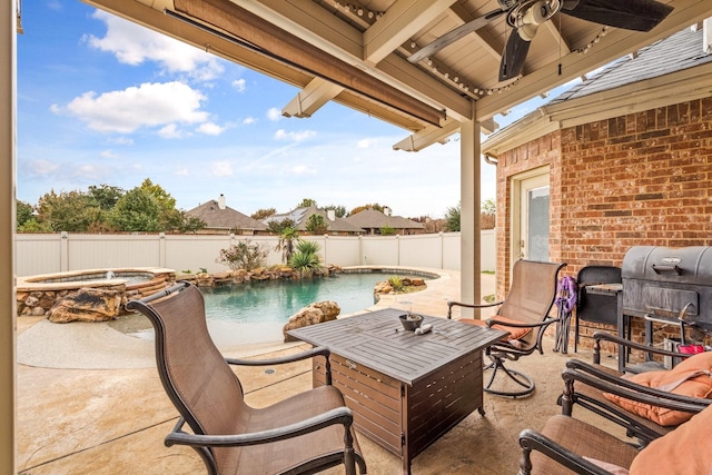 view of patio / terrace featuring a pool with hot tub, a grill, and ceiling fan