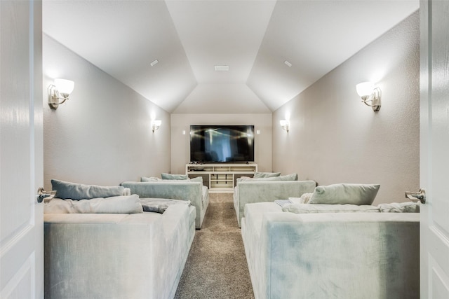 cinema featuring carpet and lofted ceiling