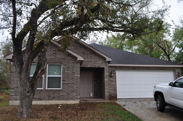 single story home with a garage