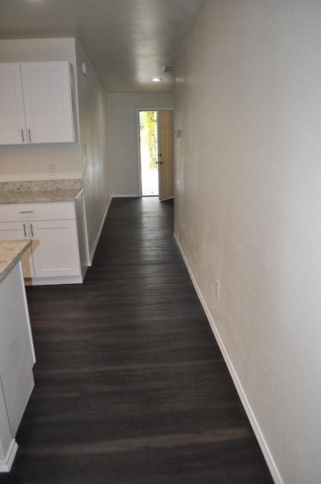 hall featuring dark hardwood / wood-style flooring