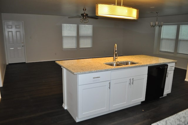 kitchen featuring white cabinetry, dishwasher, sink, hanging light fixtures, and dark hardwood / wood-style flooring