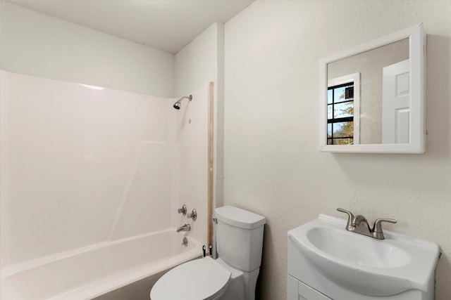 full bathroom with vanity, toilet, and shower / washtub combination