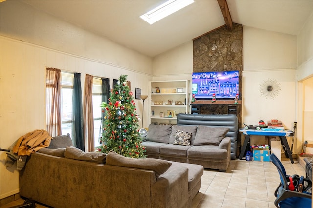 living room with high vaulted ceiling, beam ceiling, and tile patterned flooring