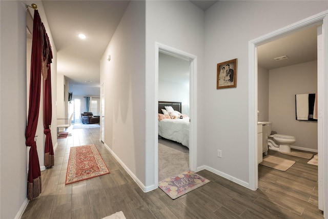 hall featuring dark hardwood / wood-style flooring