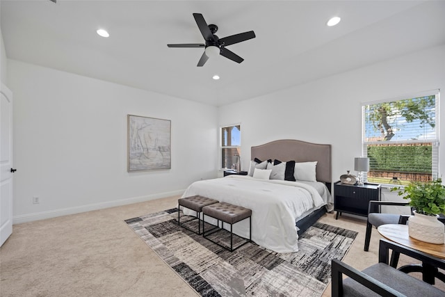 carpeted bedroom featuring ceiling fan