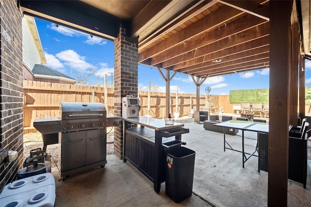 view of patio / terrace featuring a grill and an outdoor hangout area