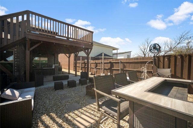 view of patio / terrace with a wooden deck and outdoor lounge area