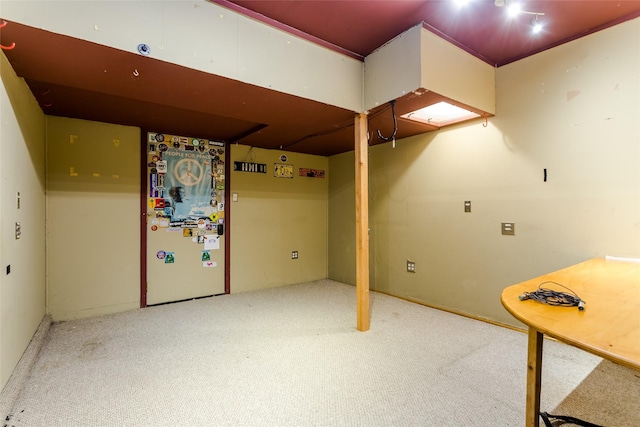 basement with carpet flooring