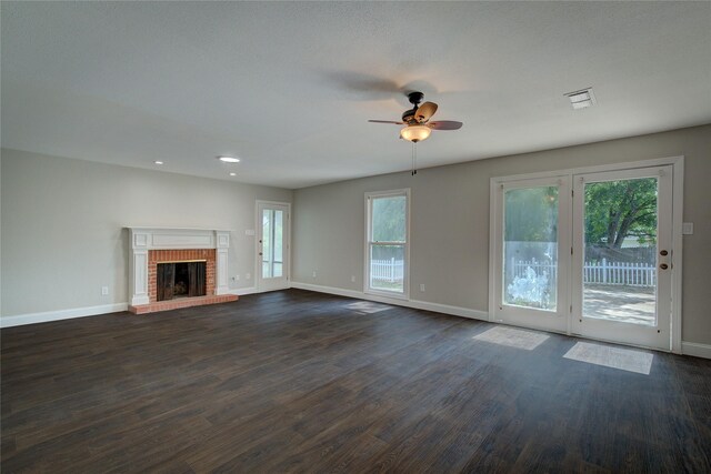 kitchen featuring dark hardwood / wood-style floors, white cabinetry, and plenty of natural light