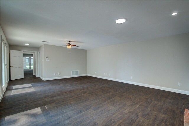 kitchen featuring decorative backsplash, sink, white cabinets, black dishwasher, and dark hardwood / wood-style floors