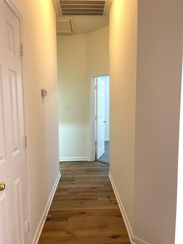 carpeted spare room with ceiling fan, lofted ceiling, and a textured ceiling