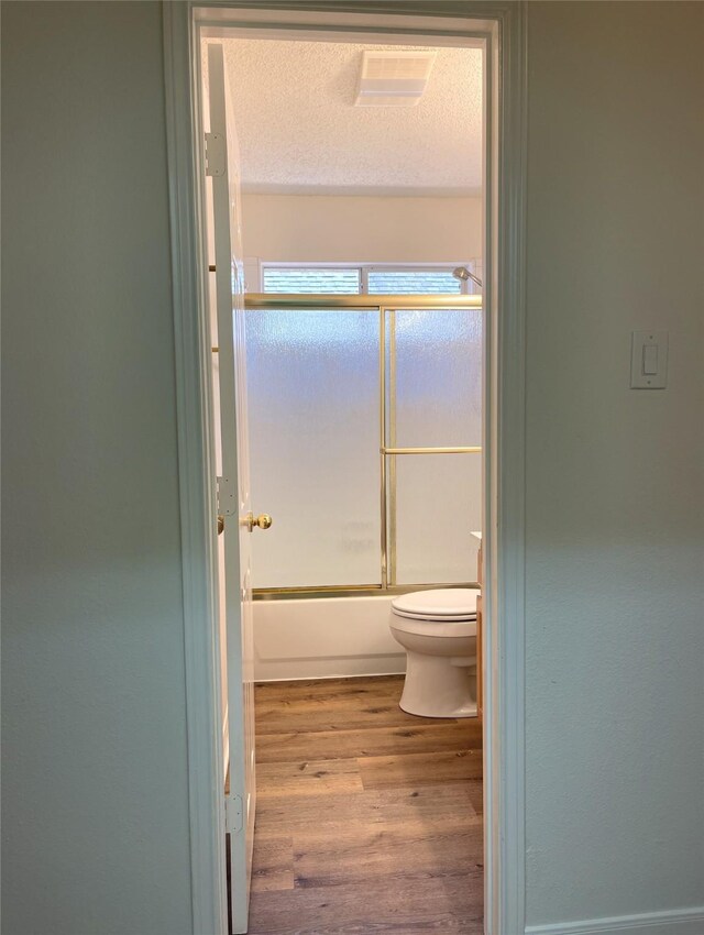 carpeted spare room featuring lofted ceiling, ceiling fan, and plenty of natural light