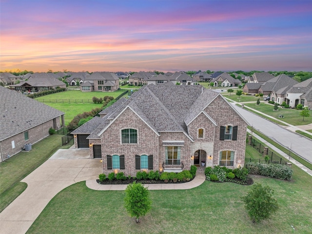 view of front of home featuring a lawn