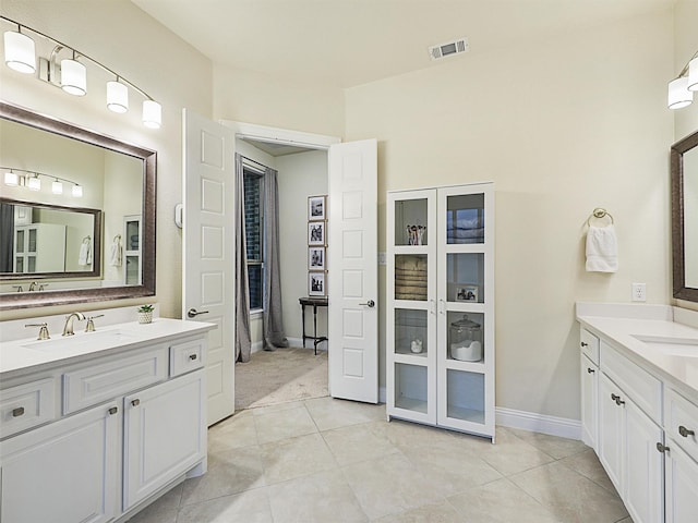 bathroom featuring vanity and tile patterned floors