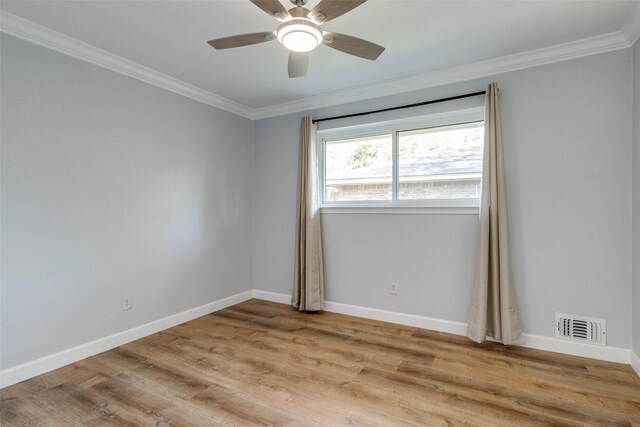 unfurnished room with ceiling fan, light hardwood / wood-style floors, and crown molding