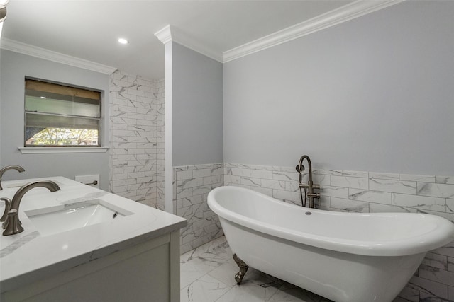 bathroom with a bathing tub, vanity, tile walls, and ornamental molding