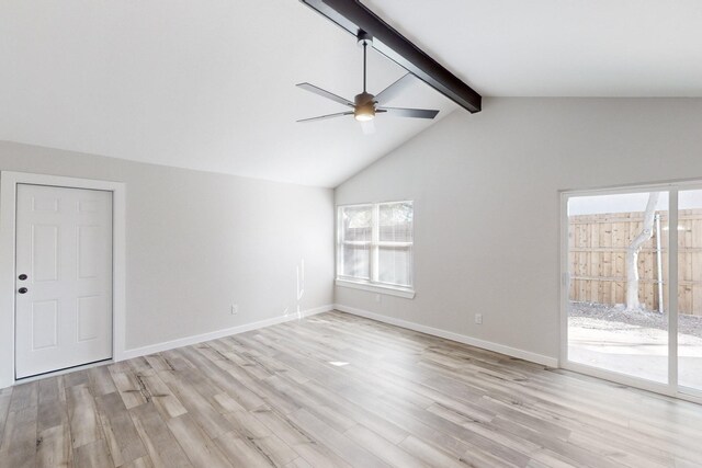 empty room with light wood-style floors, vaulted ceiling with beams, baseboards, and a ceiling fan