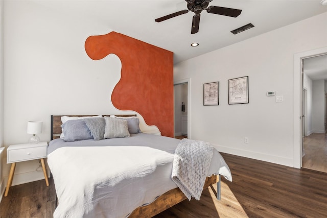 bedroom featuring recessed lighting, wood finished floors, a ceiling fan, visible vents, and baseboards