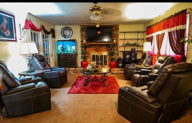 living room featuring carpet flooring, ceiling fan, and a fireplace