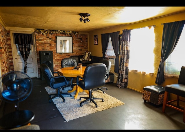 office featuring brick wall