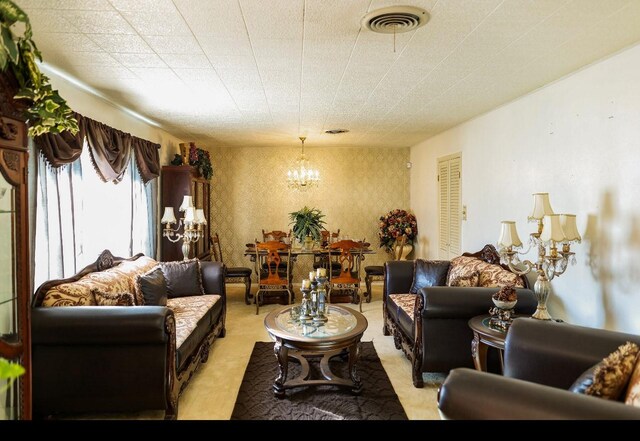 living room featuring a notable chandelier