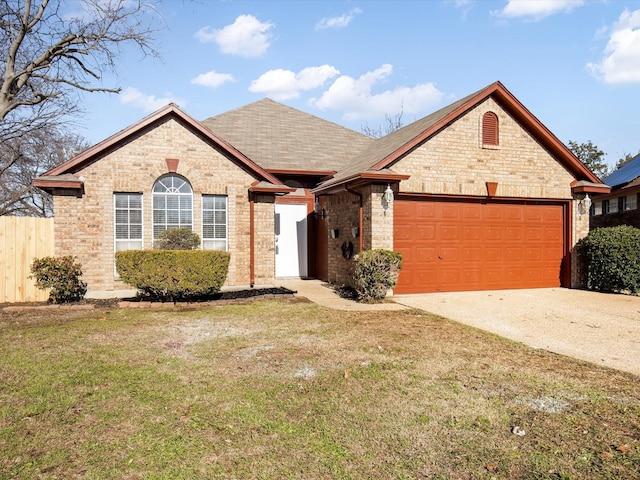 single story home featuring a front yard and a garage