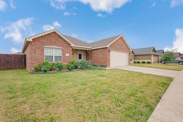 single story home featuring a garage and a front lawn