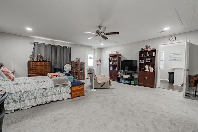 carpeted bedroom with ceiling fan