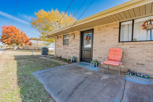 property entrance with a yard