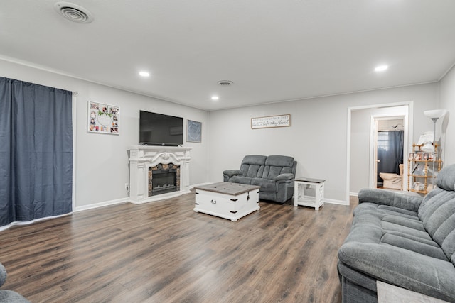 living room with dark hardwood / wood-style floors