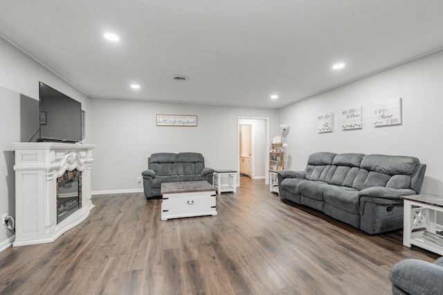 living room with dark hardwood / wood-style floors