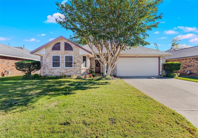 507 Azalea Dr, Forney, TX 75126 - ranch-style house featuring a garage, driveway, brick siding, and a front yard
