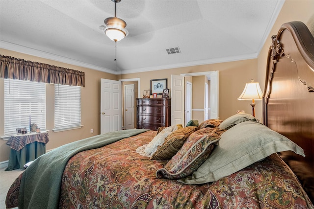 carpeted bedroom with a textured ceiling, ceiling fan, crown molding, and lofted ceiling