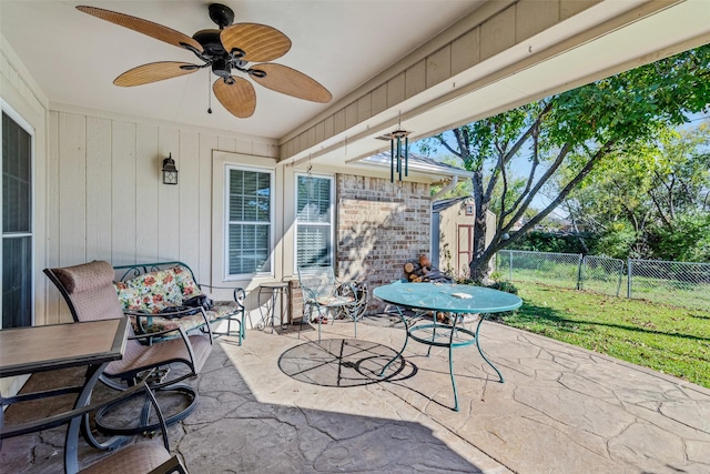 view of patio featuring ceiling fan