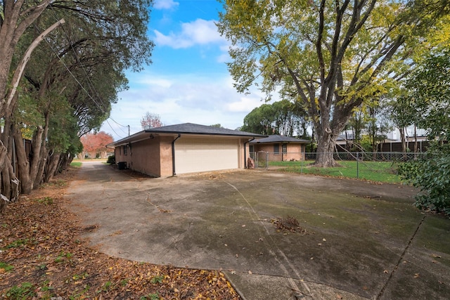 view of home's exterior featuring a garage