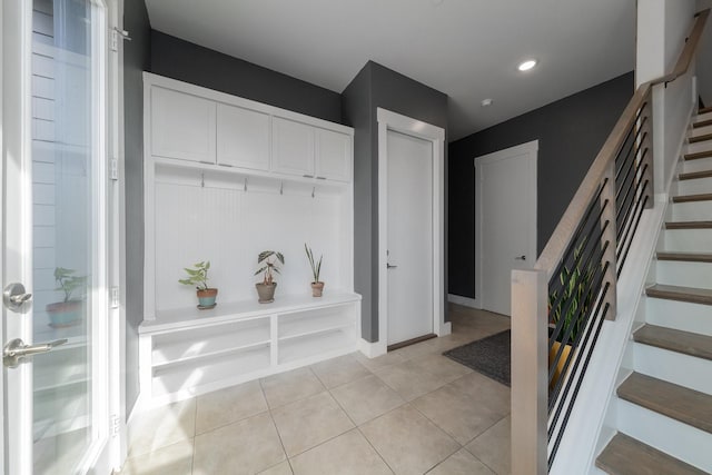 mudroom featuring light tile patterned floors